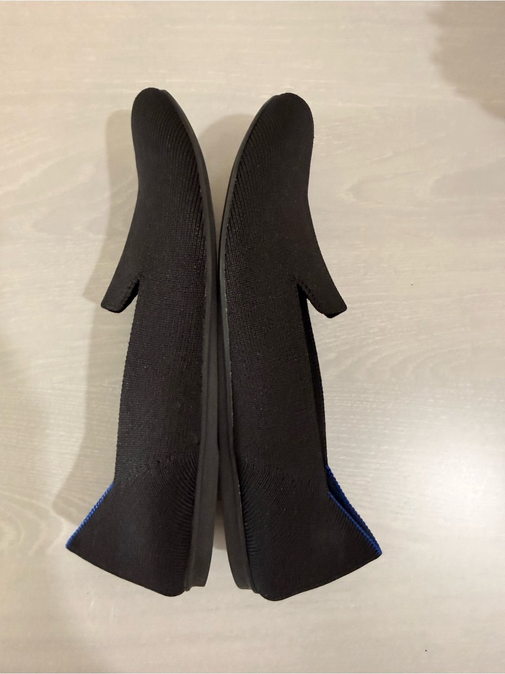 Rothy's Black Slip-On Flats with Blue Trim - Picture 4 of 8